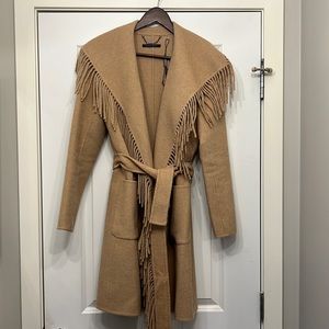 Wool blend camel colored fringe belted wrap coat